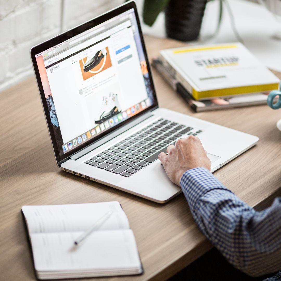 Man researching on laptop