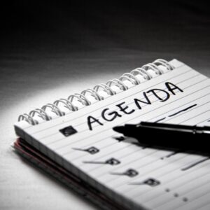 Agenda notes on notepad