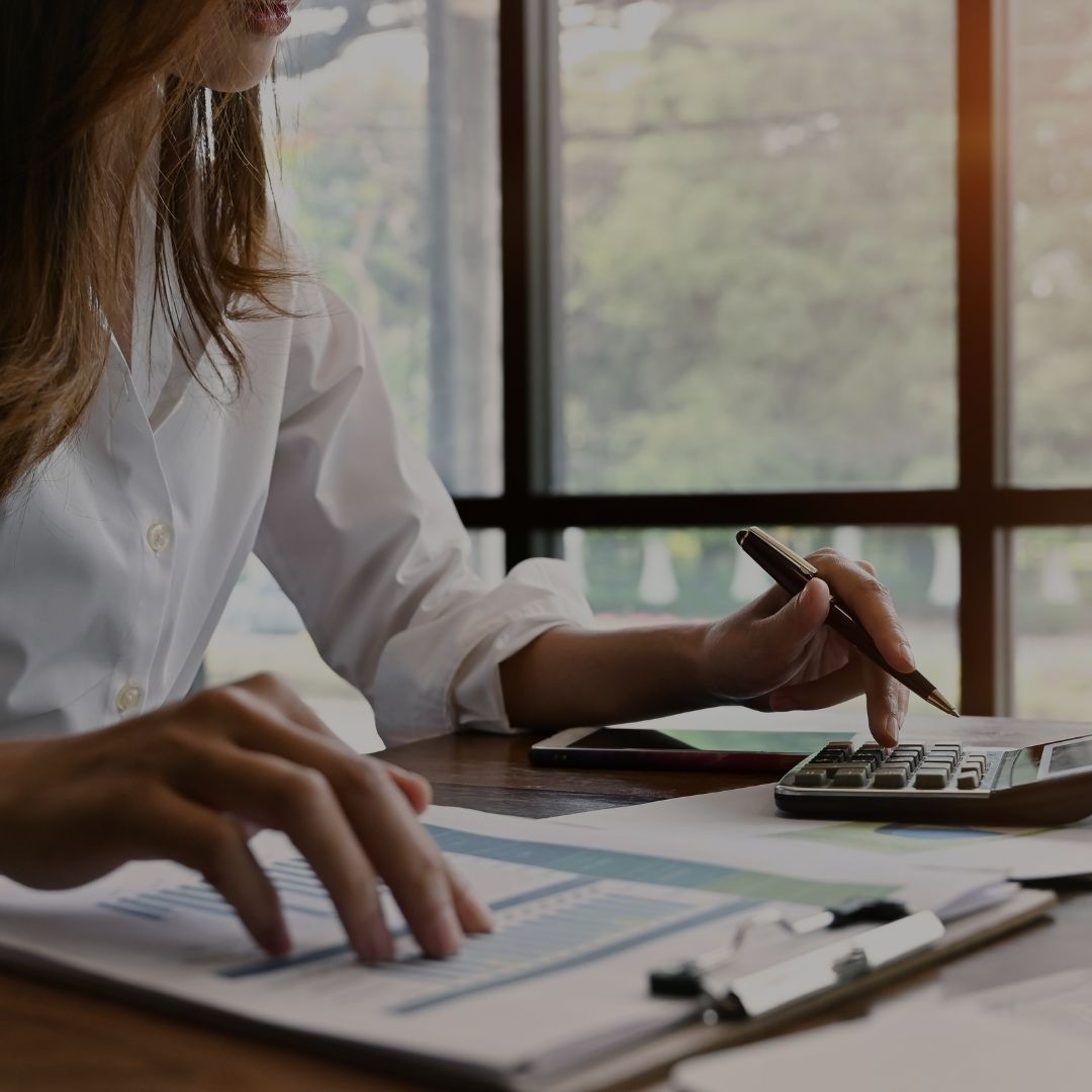 A person calculating finances