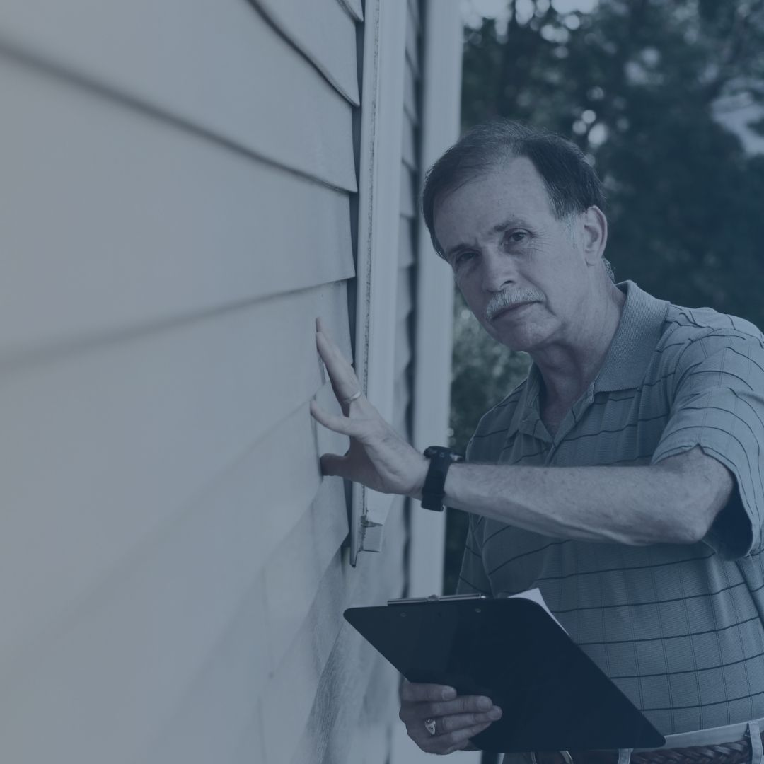 inspecting siding